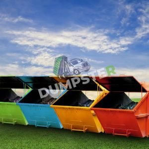 Yard Dumpster (1) 4 colorful dumpster on green grass.